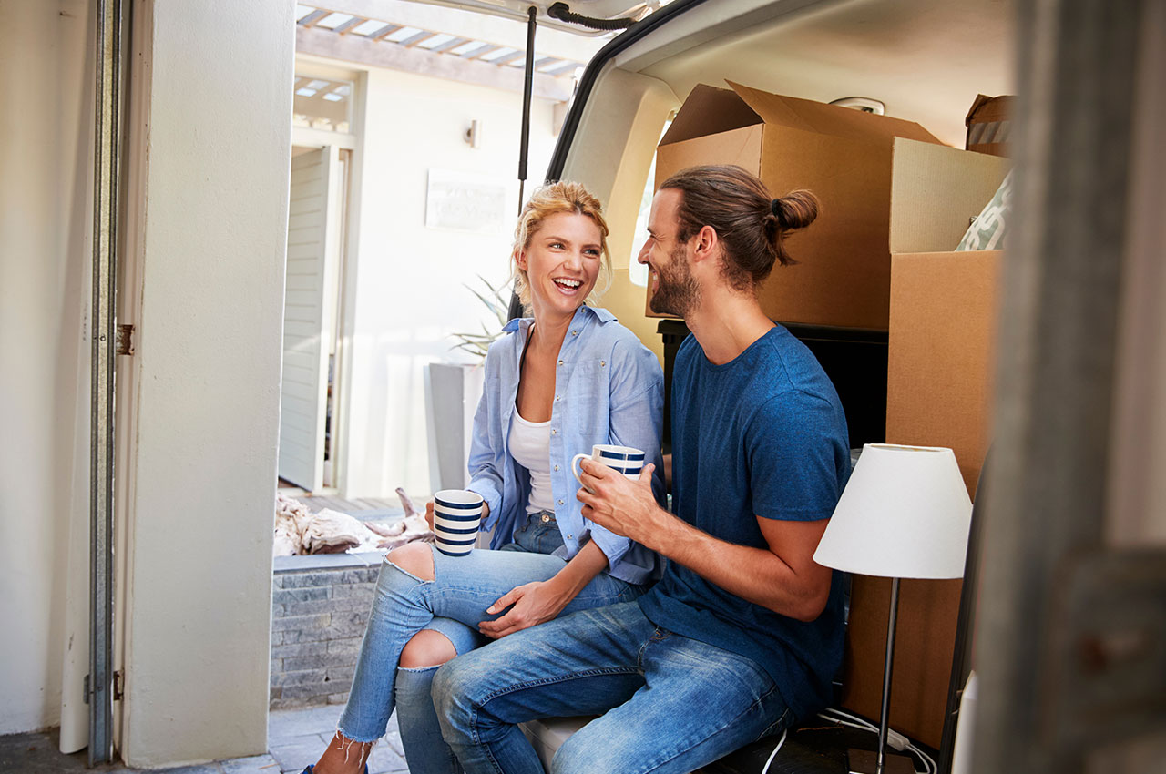 a couple who have used a home movers service for moving house