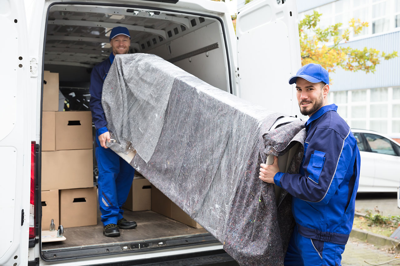 house movers showing how to pack a van for moving house